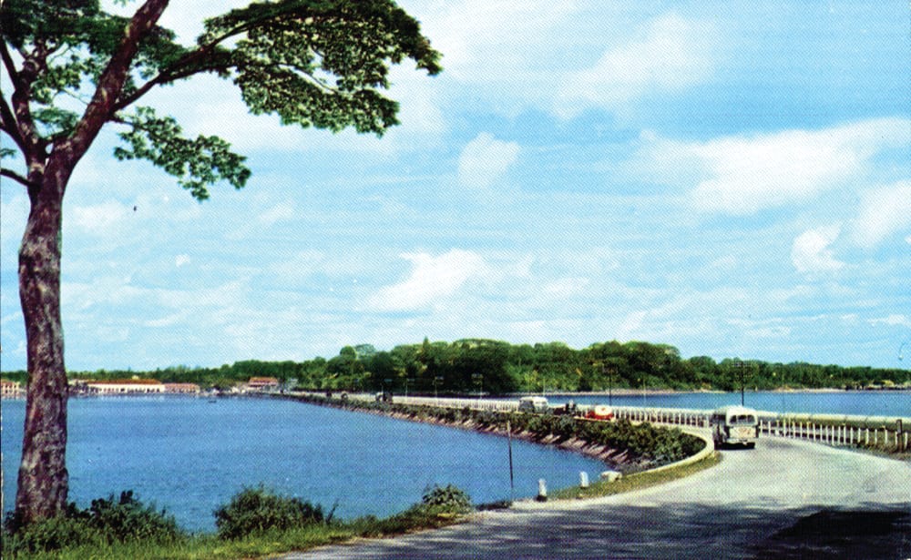 1950s: Causeway between Singapore and Malaysia. The railway track can be seen at the right. Photo from the author’s collection.